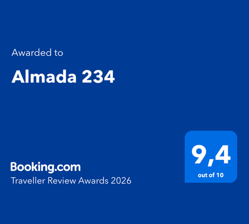 Cartão do Booking.com Traveller Review Awards 2026 atribuído ao Almada 234, com classificação 9,4 em 10.