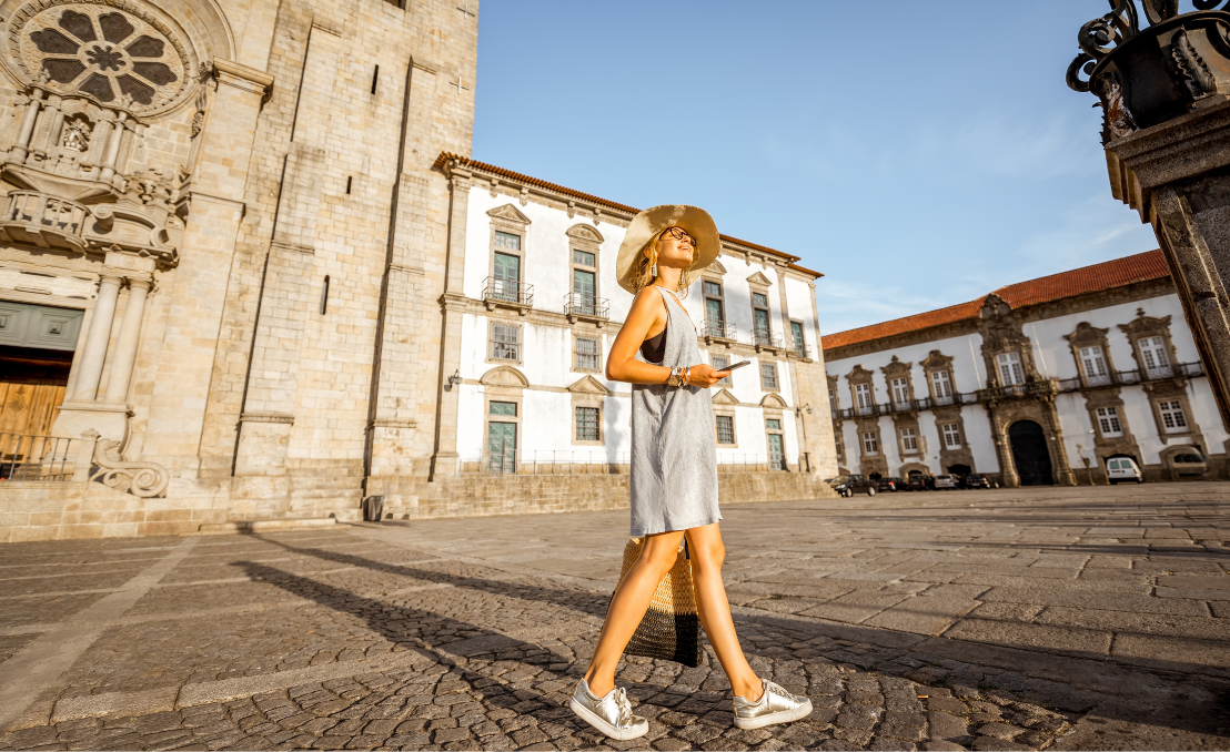 Tourist exploring Porto city centre on foot